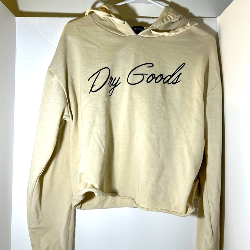 Originality cropped hoodie dry goods size large  long sleeves cream black Y2K
